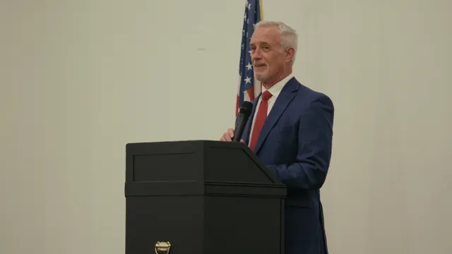 Kevin Bersche speaks at the podium during the campaign launch
